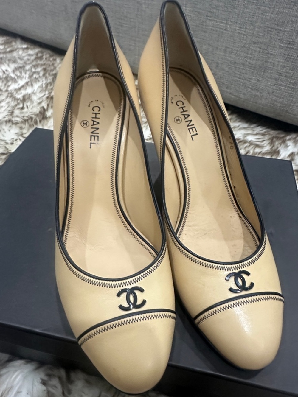 CHANEL Beige Pumps with Black Trim and CC Logo
